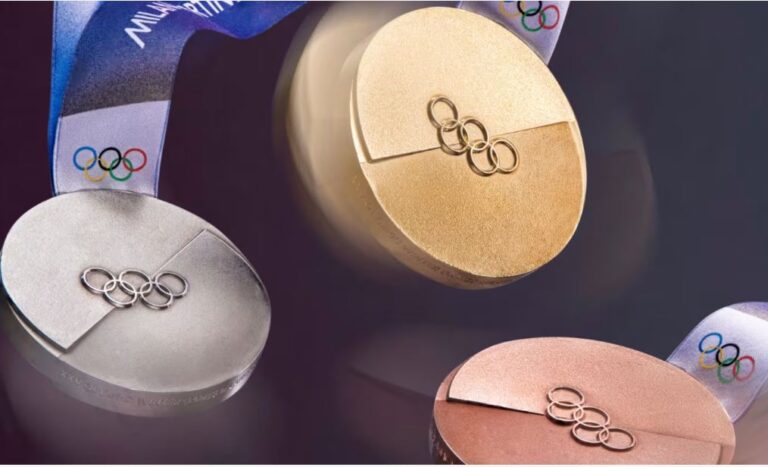 Olympics & medals, winning gold, buying a home and getting to put the Sold sticker on the For Sale board